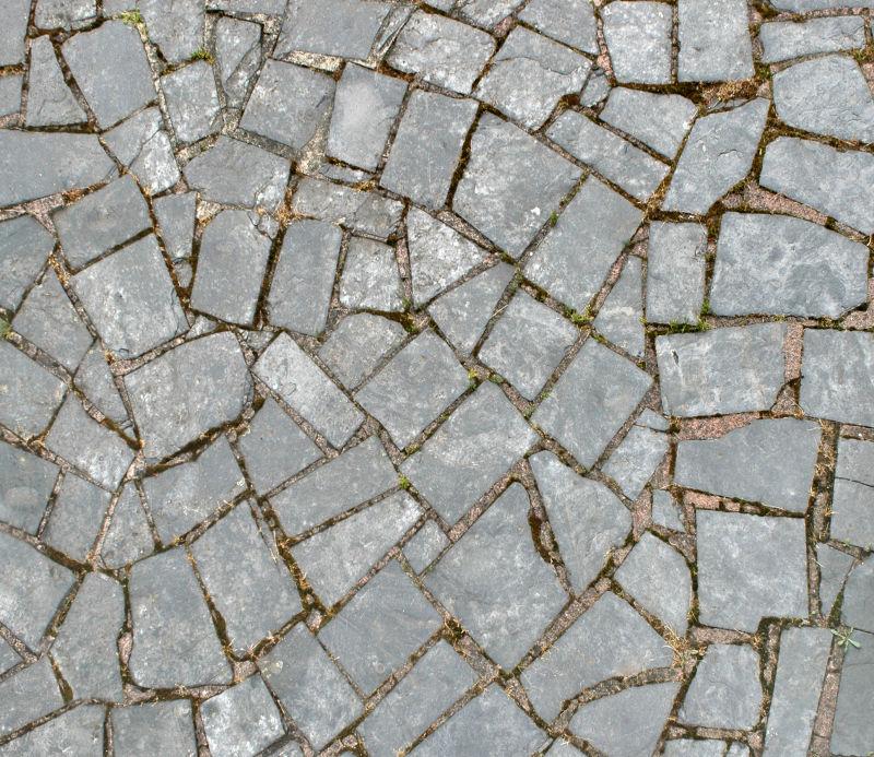碎石头垒砌的路面背景
