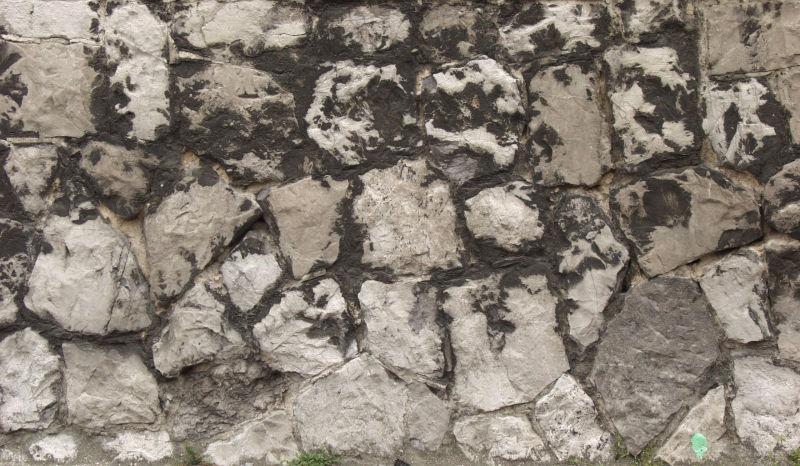 有点发黑的石墙背景
