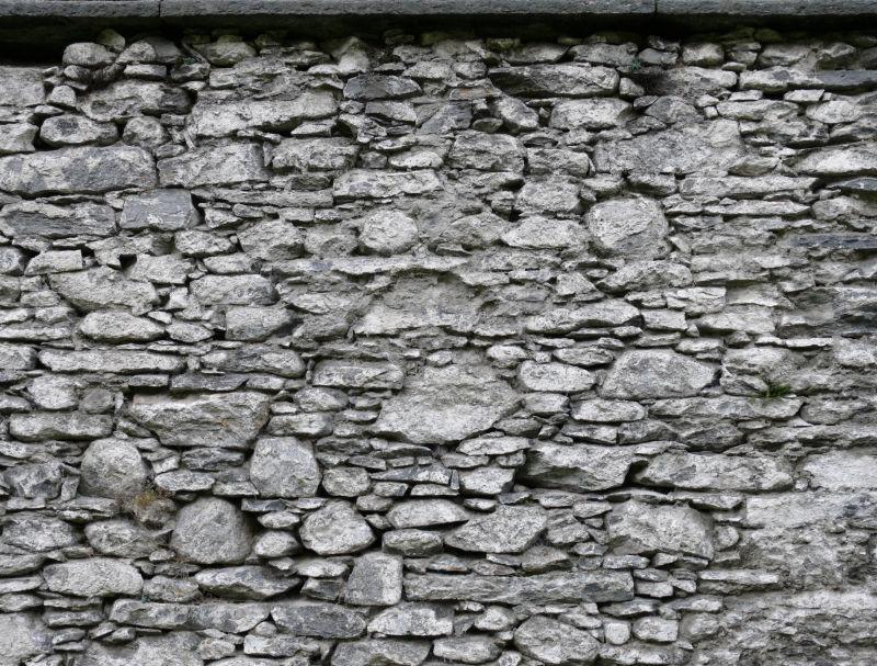 长短不一石墙背景