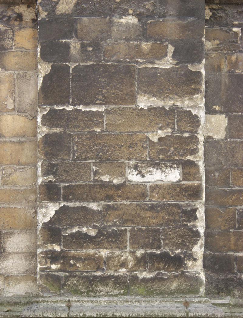 老旧发黑石墙背景