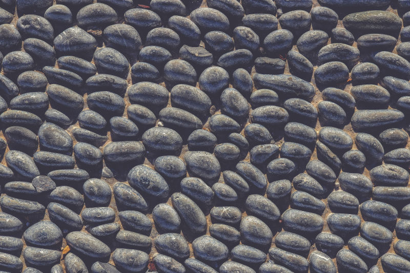 大量白色砖石覆盖卵石纹理石头图案BAC