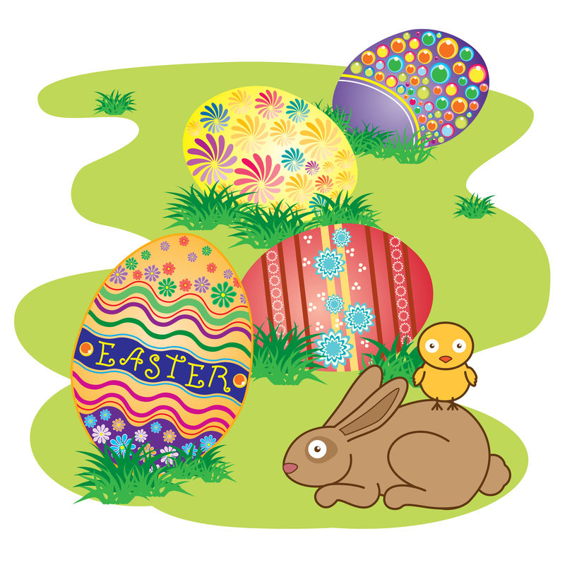 复活节兔子-在新鲜的绿草上装饰复活节彩蛋