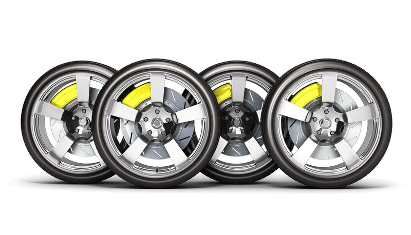 在白色背景3D上隔离带制动器的车轮