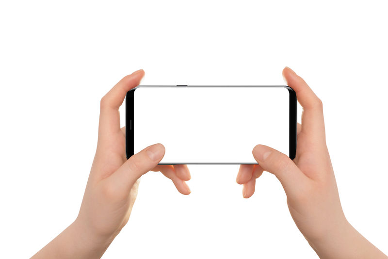 女性手把现代的黑色手机放在水平位置白色背景的独立手和智能手机素材 高清图片 摄影照片 寻图免费打包下载