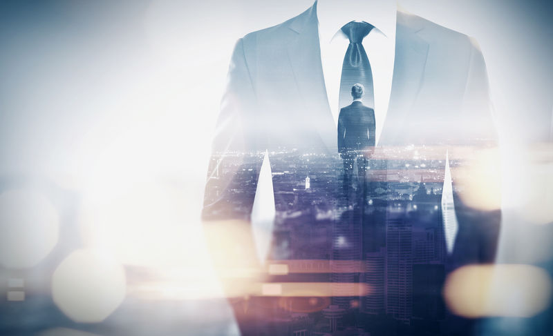 双重曝光概念与商人剪影-带特殊照明效果