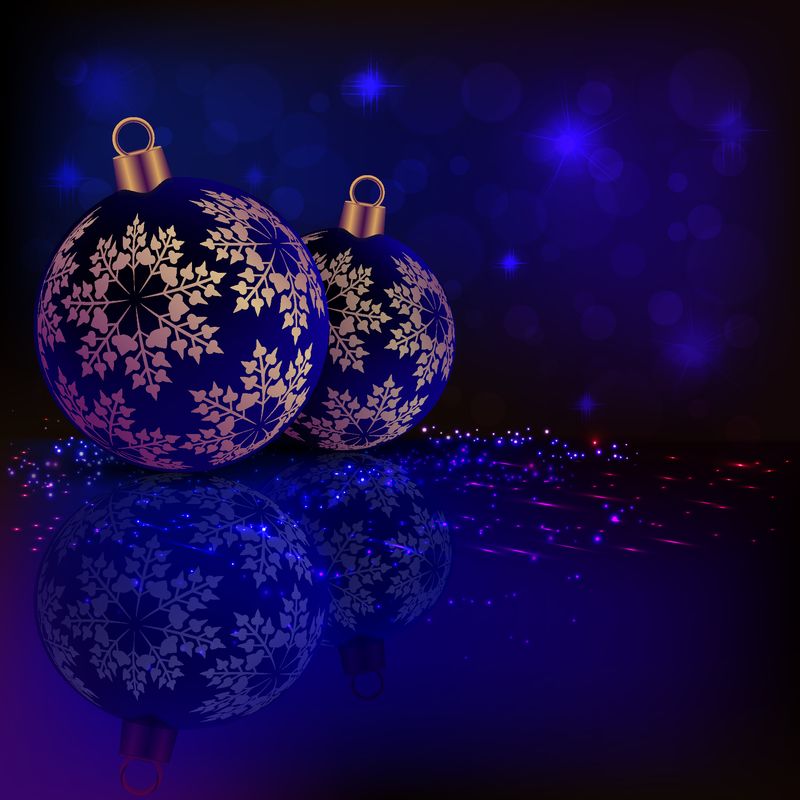 圣诞用深蓝色的两个球和金色雪花组成