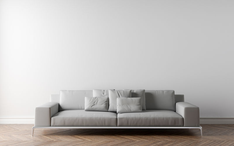 空房间的沙发，地板上的镶木地板。