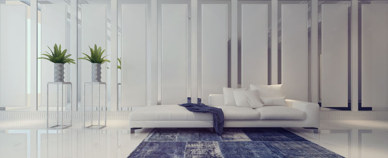 宽敞的白色客厅配有植物和沙发