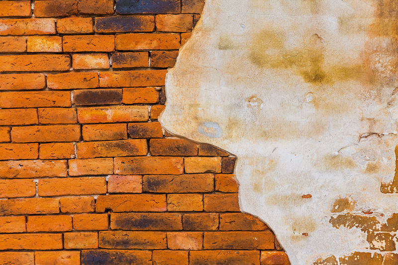 开裂的混凝土复古砖墙背景