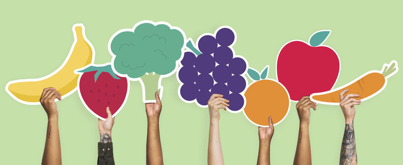 手拿水果和蔬菜的阴蒂