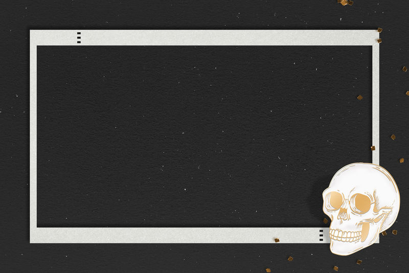 黑色背景上的金色头骨框架