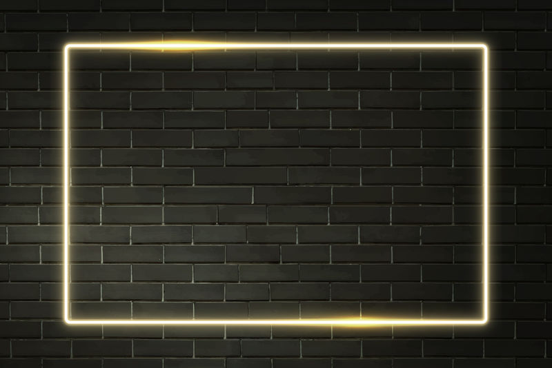 黑色砖墙矢量上的矩形黄色霓虹灯边框