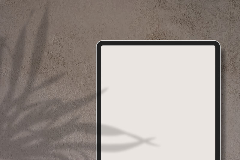 棕色大理石背景向量上的数字平板模型