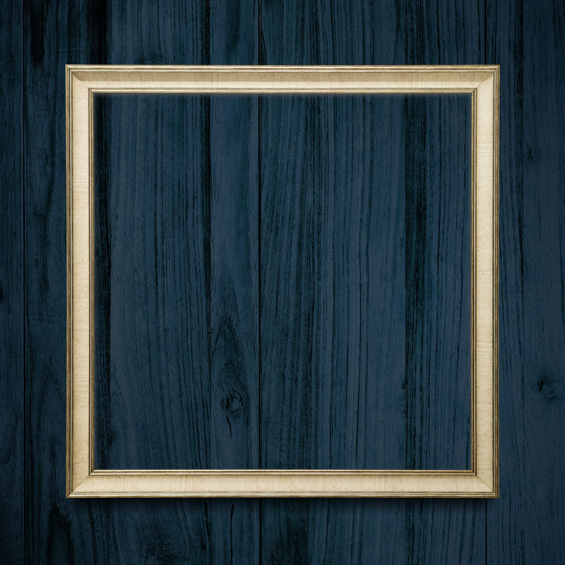 深蓝色木质纹理背景上的方形框架