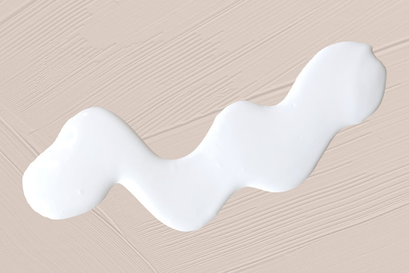 米色纹理背景上的白色元素psd