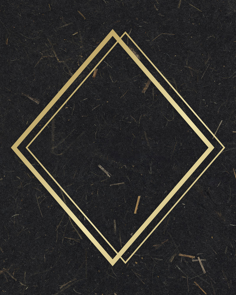 黑色桑椹纸纹理背景上的金色菱形框架