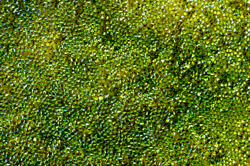 金属绿色尖头螺柱纹理背景