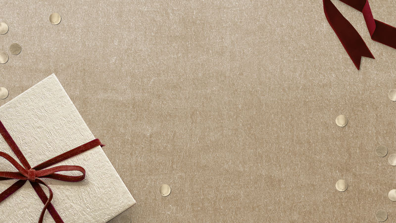 米黄色背景博客横幅上的圣诞礼物psd