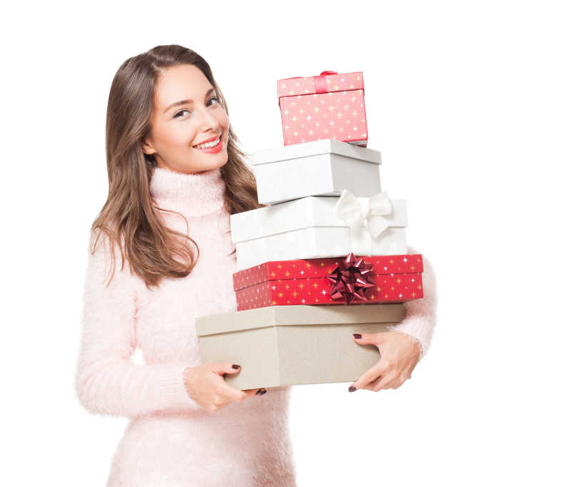 白色背景下的美女抱着礼品盒
