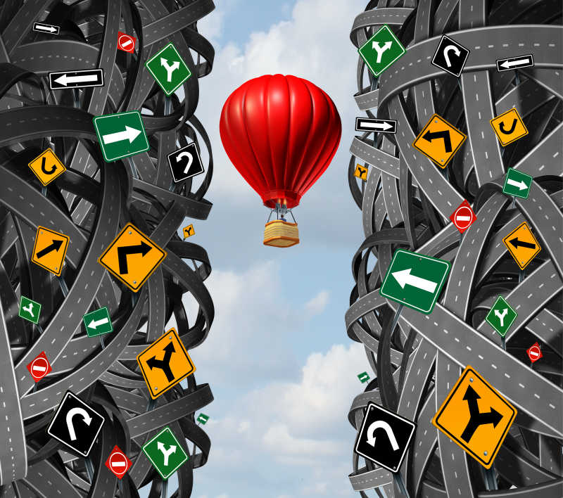 一个商人在一个热气球向上飞的概念