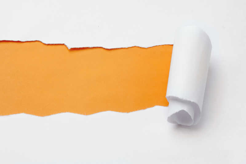 一张纸撕开露出黄色的背景