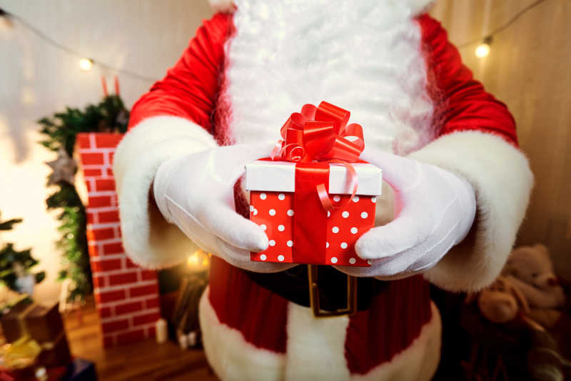 创意图片 圣诞老人正在写长长的礼物清单系列 一 发放礼物的圣诞老人