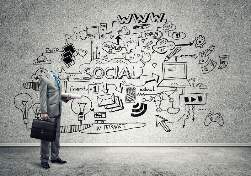 手里拿着图纸和公文包的无头商人