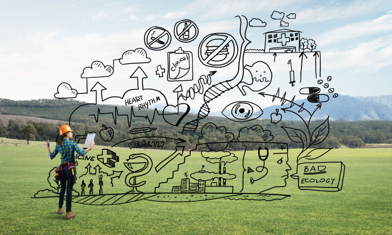 虚拟屏幕上的工程维修草图和草地上的女工程师