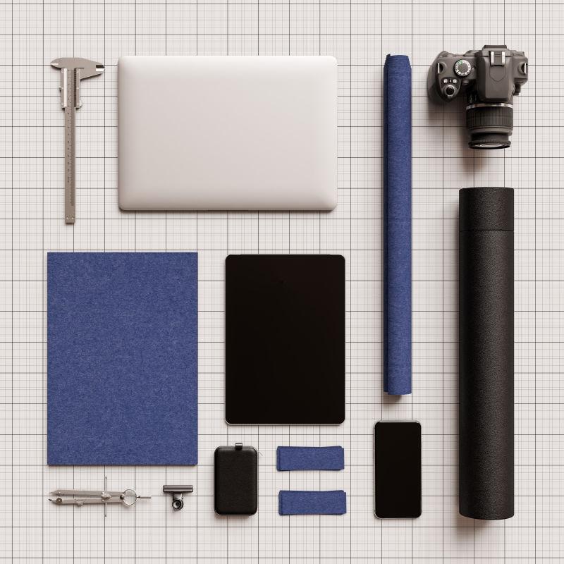 白色桌子上的品牌文具模型场景